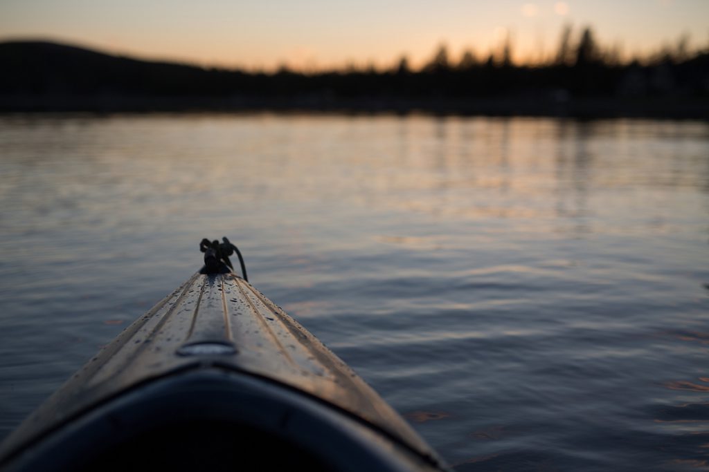 Canoe on a lake at tsunset